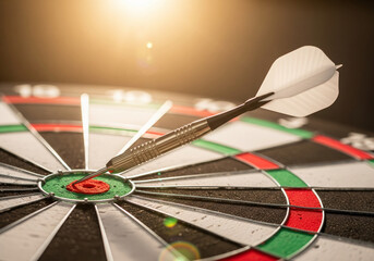 Bullseye Success: White Dart Hitting Exact Center of Target with Lens Flare
​Business Strategy Concept: Perfect Shot Hitting the Goal Center