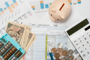 確定申告と帳簿と損益計算のイメージ