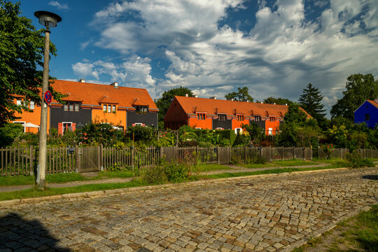 Colorful houses in the garden city of Falkenberg in Berlin