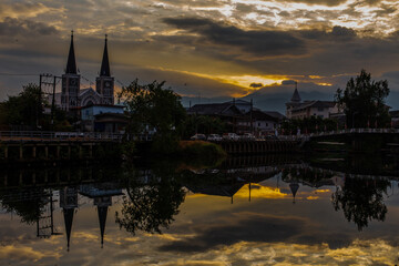 The backdrop of colorful sky lights reflecting off the beautiful river surface at different times...