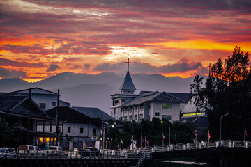 The backdrop of colorful sky lights reflecting off the beautiful river surface at different times...