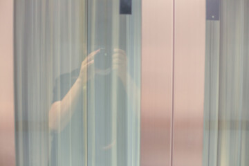 The backdrop of the evening sky along the river, with riverside houses and communities, or tall...