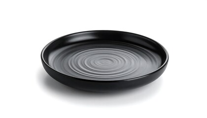 A simple black ceramic plate with a textured surface.