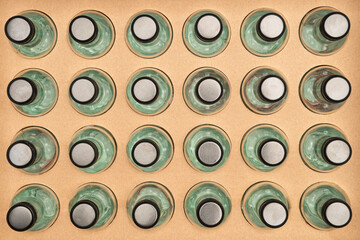 Looking Straight Down on a Case of Wine Bottlels as Absrtact Art