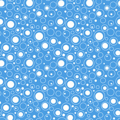 Blue and White Circle Pattern. There are two types of circles: solid white circles and white circles with blue centers.