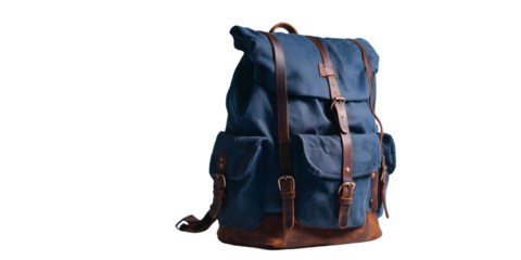 Blue canvas backpack with leather straps isolated on white background