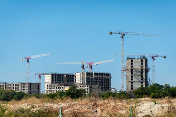 New residential district under construction in Novorossiysk, Russia, with unfinished monolithic...