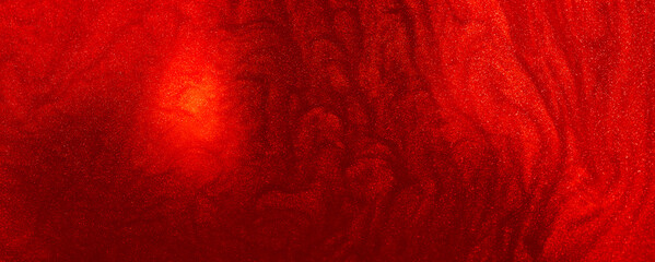 Shimmering red abstract background. Liquid glitter paint texture waves and swirls. Beautiful shiny...