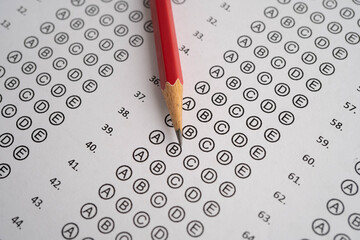 Answer sheets with pencil drawing fill to select choice, education.