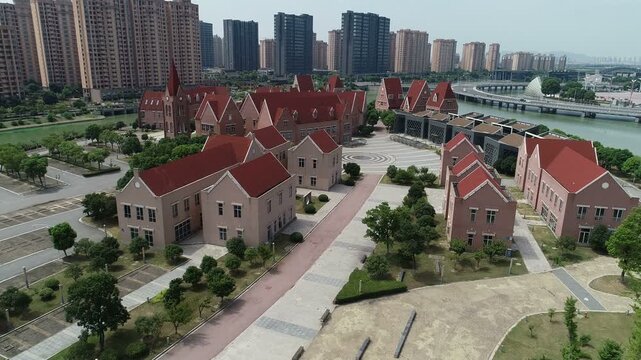 Drone footage of abandoned replica of village resembling town in Holland, in ghost town in residential suburban neighborhood in Suzhou, China
