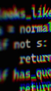 Vibe Coding with AI Chatbot writing python script to parse data. Blurred computer code displayed on screen in a colorful, glitch-like style.