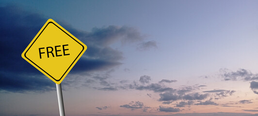 Yellow transportation sign with word free on violet sky background