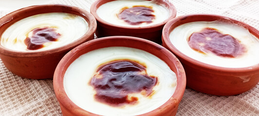 Traditional turkish dessert bakery rice pudding Turkish name Fırın Sutlac in glass bowl