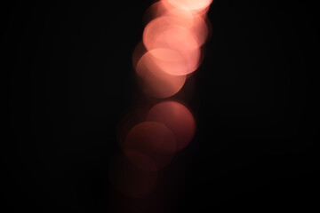 red glowing lights in the dark,yellow glitter bokeh lights on black background,abstract background of red bokeh lights,light leak overlay effect with bokeh ,red christmas lights