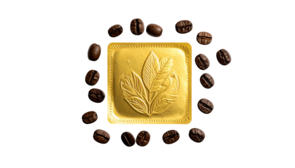 Gold square with floral design encircled by roasted coffee beans on a black background