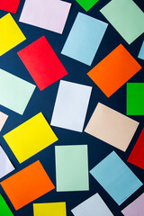 Colorful abstract background with scattered paper cards