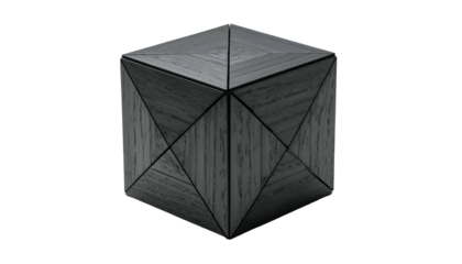 A grey, geometric cube with textured surfaces, divided by intersecting diagonal lines