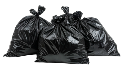 Four black plastic bags filled and tied closed, isolated on black background
