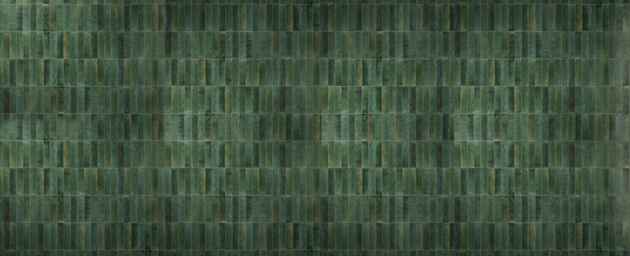 Dark green vertical ceramic tile texture with mossy color variations and vintage glossy finish for interior backgrounds.