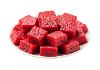 red sugar cubes on white plate closeup