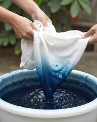 Textile Artist Dipping Fabric in Indigo Dye Vat - Sustainable Fashion