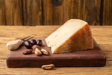 Parmesan cheese over wooden table