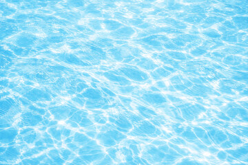 Fototapeta premium Crystal Clear Blue Pool Water with Gentle Reflections and Waves