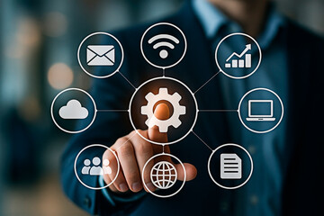 A businessman interacting with digital icons for technology and communication