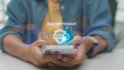 Fototapeta na wymiar Smartphone user allowing app permission with security shield and password icons. Data privacy, access control, and user consent concept. Cyber security for mobile application login and authentication.