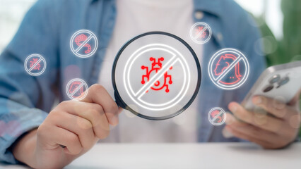 Smartphone user holding magnifying glass with antivirus, trojan, worm, and bug icons. Cyber security, malware scanning, and system protection. Technology internet safety and firewall defense concept.