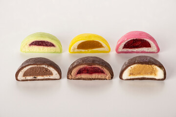 Colorful assortment of traditional confectionery sweets, featuring various flavors and textures, displayed on a clean surface, showcasing delightful dessert options for festive occasions