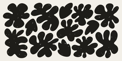 Abstract black shapes and forms arranged in a repeating pattern on a white background