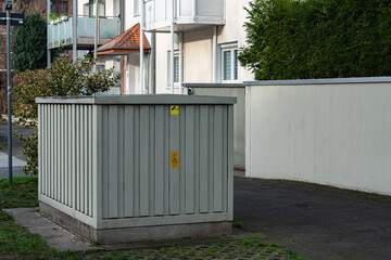Utility box placed near residential building on a street