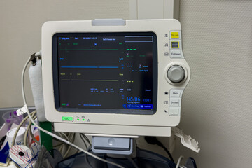 Medical monitor displaying vital signs in a health facility