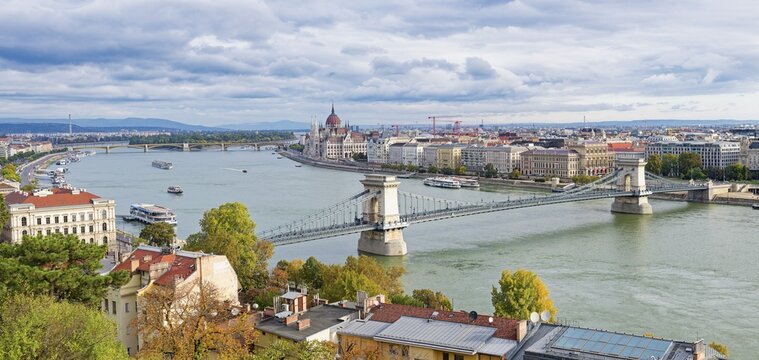 Hungarian parliament along the Danube River and Chain Bridge, Budapest, Hungary