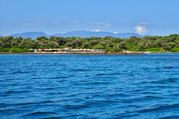 Greece - view from a boat on the seacoast of Monolia island with Lichadonisia beach