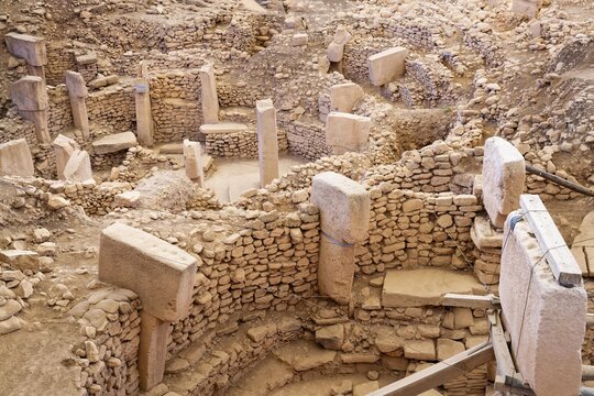 Gobekli Tepe neolithic archaeological site dating from 10 millennium BC, Large circular structures with massive stone pillars, Potbelly Hill, Sanliurfa, Turkey