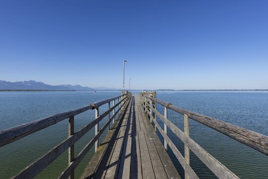 Wooden jetty and boat landing stage, Chieming, Chiemsee, Chiemgau, Bavaria, Germany