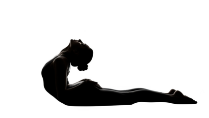 Silhouette of a woman in a yoga pose against a black background image