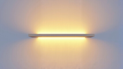 Modern wall light fixture illuminating a white background  
