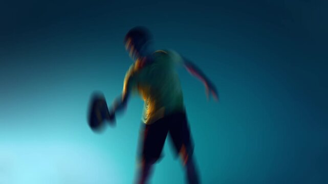 Modern ad video. Abstract tennis player in action with colorful motion blur. Concept of court movement, youth sport energy and dynamic visuals for posters, social posts and editorial backgrounds.