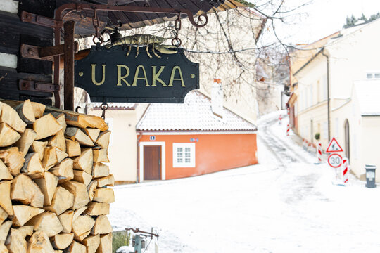 Prague, czech republic - november 24, 2025: prague novy svet street with u raka sign in winter in hradcany