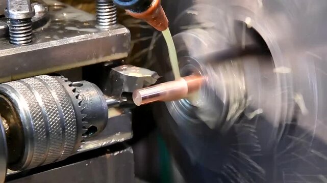 Manufacturing of a part on a lathe with the supply of an emulsion. The process of mechanical fabrication of a metal element.