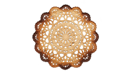 Ornate golden brown lace doily with intricate floral pattern on black background image