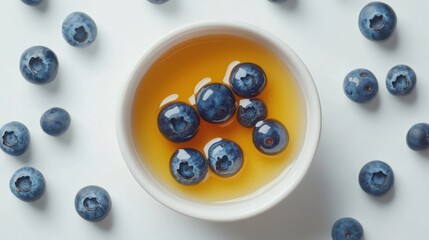 Top view breakfast pancakes with honey butter and blueberries on white background