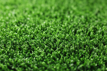 Naklejka premium Freshly mowed green grass field