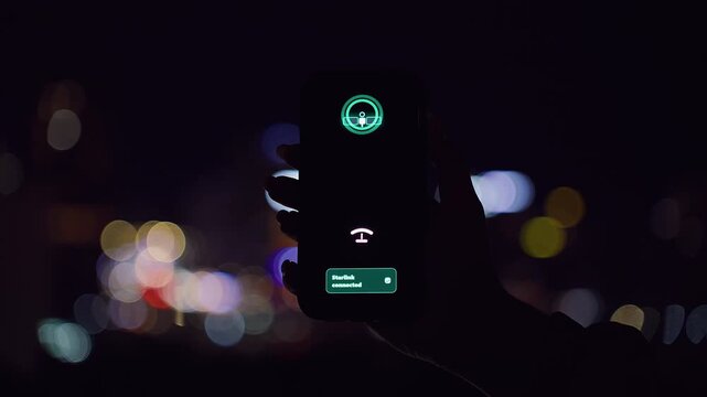 Smartphone Showing Starlink Connected Icon Held Against Vibrant Night City Bokeh in a Close Angle Dark View Representing Satellite Connection Moment
