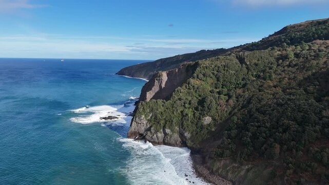 Sweeping Aerial Shot Gaztelugatxe Ocean Waves and Pilgrimage Path