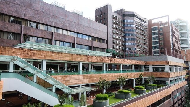 Composite Building, The University of Hong Kong, Pok Fu Lam, Hong Kong- 23 Aug 2025: the building where Student Union and Student Union food canteen located and a escalators in daytime