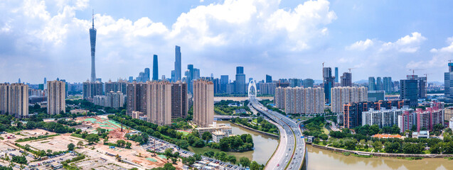 Guangzhou City Aerial View with Modern Skyline and River Bridge © TaVan